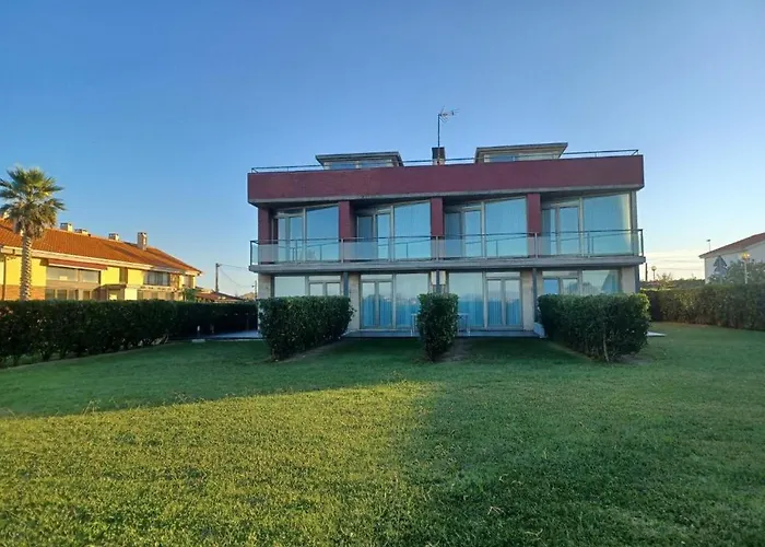 Apartamentos Playa De Portio